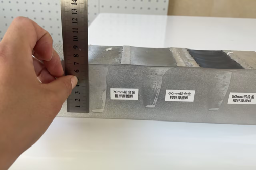 重型铆焊加工常用的大电流焊接设备_万宇科技大厚度有色金属焊接解决方案_超大焊深2D卧式重载双立柱搅拌摩擦焊设备